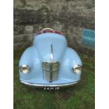 A blue Austin swing pedal car, with opening boot, and bonnet opening to reveal a dummy engine,