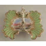 A Grainger's Worcester basket of leaf design, decorated with a view of Worcester to a green