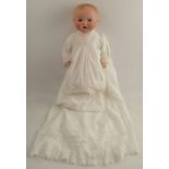 An Armand Marseille bisque headed doll, stamped 518/10K, height 24ins