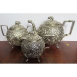 A 19th Century three piece Indian silver tea service, no marks, weight 31oz all in - The base of the