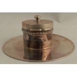 A silver inkwell, of circular form, with gadrooned band, London 1896, weight 8oz