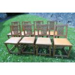A set of eight lattice back oak dining chairs, by Sid Pollard
