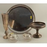 A collection of hallmarked silver, to include a bud vase, pedestal dish and two dressing table jars