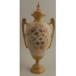 A Royal Worcester blush ivory covered pedestal vase, decorated with flowers front and back, shape
