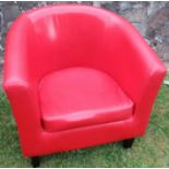 A modern red tub chair, with fire labels