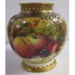 A Royal Worcester vase, the front painted with fruit to a mossy background by Ricketts, shape number