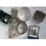 A collection of hallmarked silver jewellery, to include a charm bracelet, two hinged bangles, etc