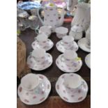 A Shelley porcelain coffee set, in the Rosebud pattern, comprising coffee pot, sugar bowl, milk