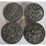Four Birmingham Mint hallmarked silver circular boxes, the covers embossed with animals, diameter