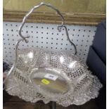 A Victorian silver oval pierced basket, with swing handle, decorated with flower heads, Birmingham