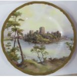 A Royal Worcester printed painted plate, decorated with a view of Pembroke Castle, diameter 10.