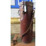 An Antique leather cylindrical case, with cover and buckle fastener, with leather strap