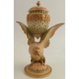 A Royal Worcester shot silk centre piece, formed as a covered reticulated vase supported on the