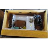 A boxed singer sewing machine