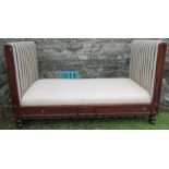 A Victorian mahogany framed day bed, by repute from Osborne House on the Isle of Wight, width 78ins,