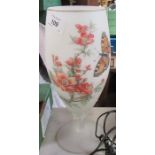 A Victorian style glass vase, decorated with flowers and butterflies