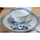 Two Nanking Cargo tea bowls and saucers, decorated in blue and white
