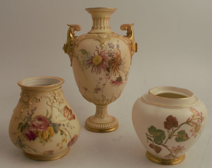 A Royal Worcester blush ivory pedestal vase, decorated with floral sprays, shape number 1618, height