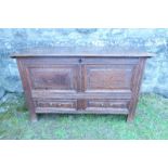 An antique oak mule chest, width 52ins x depth 21ins x height 32ins