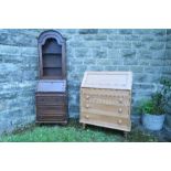 A reproduction bureau bookcase, the upper domed section with mesh door, and three drawers to the