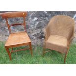 A lloyd loom style chair, together with a Regency design chair