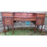 A 19th century mahogany sideboard, raised on reeded legs, width 81ins, depth 27.5ins, height 33ins