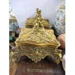 A pair of gilt composition covered boxes, of rectangular form, decorated in the classical style with