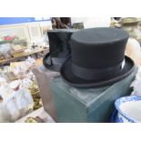 An Anthony Graham top hat, size 56cm / 6 7/8", boxed, together with another boxed top hat, af, and a