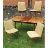 A 20th century extending dining table and four chairs, possibly Golden Key Alfred Cox, table 62.5ins