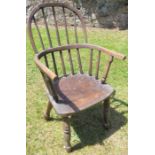 A child's Windsor armchair, with turned front supports