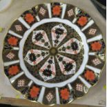 A Royal Crown Derby 1128 Imari pattern plate, with frilly edge, XLIX, diameter 8.5ins