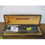 A Hohner, 64 Chromonica, boxed