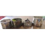 Three hallmarked silver napkin rings, weight 3oz, together with another napkin ring
