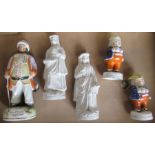A 19th century Staffordshire figure, Falstaff, height 10ins, together with a pair of Staffordshire