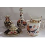 A collection of 19th century Derby porcelain, all decorated in a version of the Imari pattern