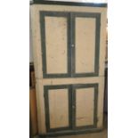 An Antique painted floor standing corner cupboard, fitted with cupboards, width 43ins, height 82ins