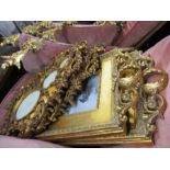 A pair of modern gilt frames, with scroll and leaf decoration, aperture size 8ins x 10ins, overall