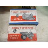 A boxed Dinky Supertoys Heavy Tractor, No. 563 together with a boxed Dinky Supertoys Dumper Truck,
