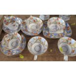 A group of 19th century English porcelain, comprising six cups, three saucers and a rectangular