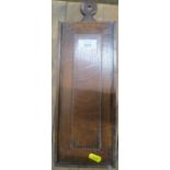 An Antique oak candle box, with fielded panel slide to the front, height 16ins