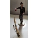 An Hartwig & Co Katshutte Art Deco model of a lady skier, with original pair of wooden skis, af,