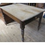 A pine scrub top table, fitted with an end drawer, 30.5ins x 48.5ins, height 29.5ins