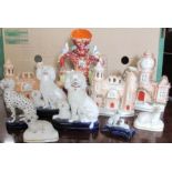 A collection of Staffordshire figures, to include animals and buildings, height 10ins and down