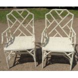 A pair of white painted bamboo style dining chairs, one with label Angraves Leicester