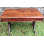 A 19th century mahogany library table, of rectangular form, fitted with real and dummy drawers,