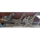 A set of three Victorian cast iron garden bench sections