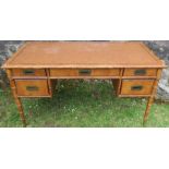 A Drexel bamboo effect desk, with leather writing surface and fitted with five drawer, 54ins x