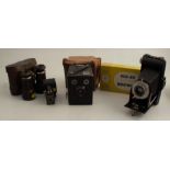 A Coronet Midget camera, with case, together with a Kodak six-20 Brownie Junior, a Kodak Six-20