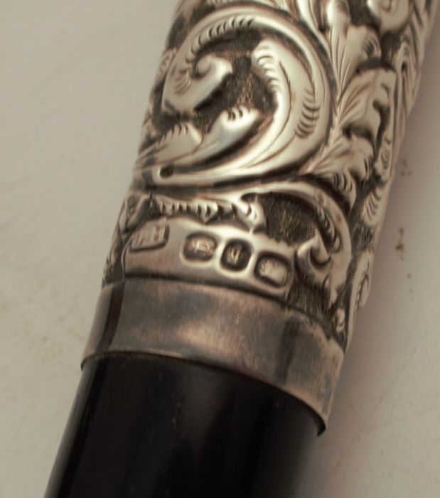A Victorian ebony and silver mounted baton, with embossed and engraved munts, in a fitted case, - Image 5 of 6
