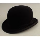 A Falcon black bowler hat, size 71/8